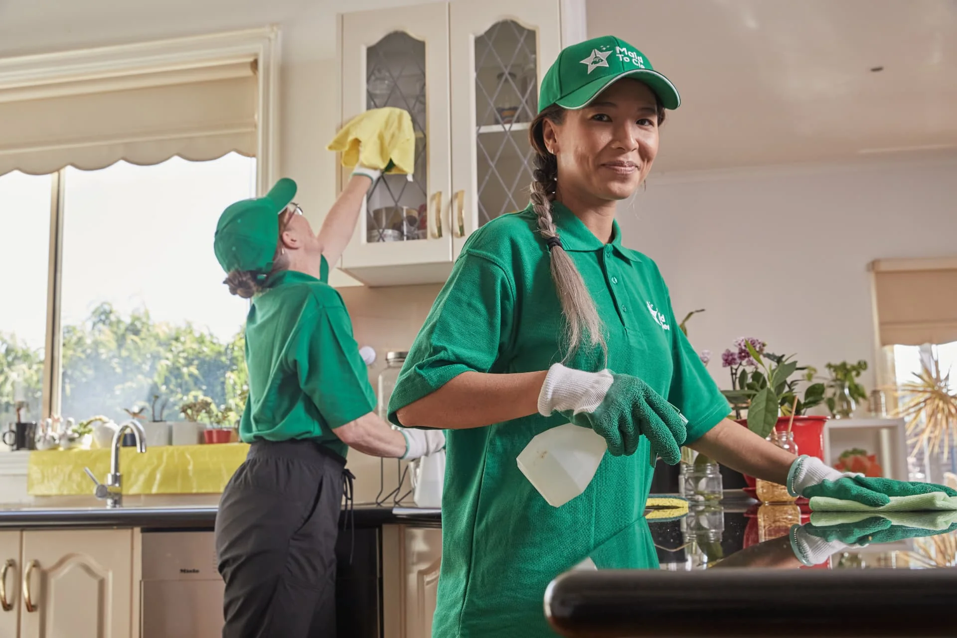 Maid to Clean cleaners working through an office kitchen and breakout area